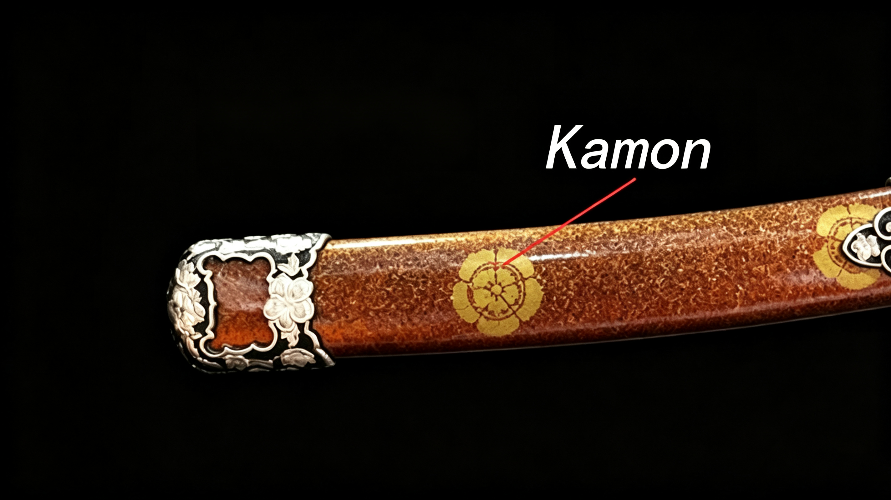 Close-up shot of golden Kamon family crest marked on vintage Japanese sword sheath, classic samurai clan emblem decoration against solid black background, 16:9 blog header image