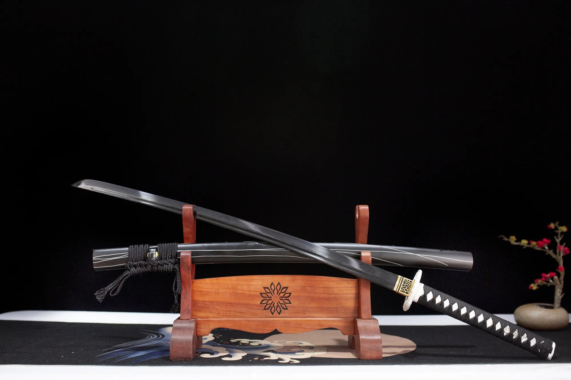This katana(samurai sword) is forged from Damascus steel. The surface is oxidized and blackened