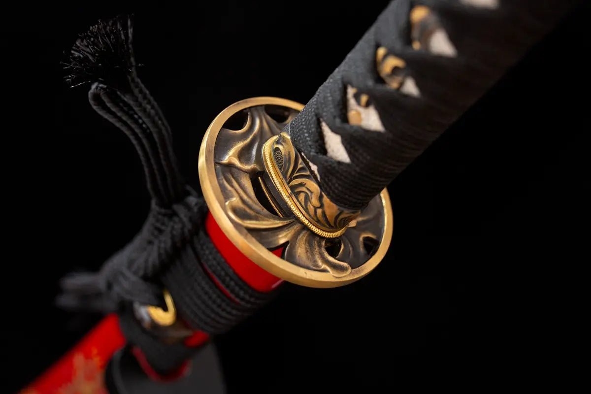 TSUBA and other accessories are made of copper and carved with the pattern of phoenix tail.