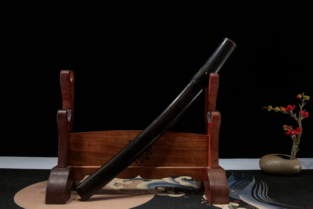Plum Blossom Dragon Tanto front angled view, solid ebony wood saya