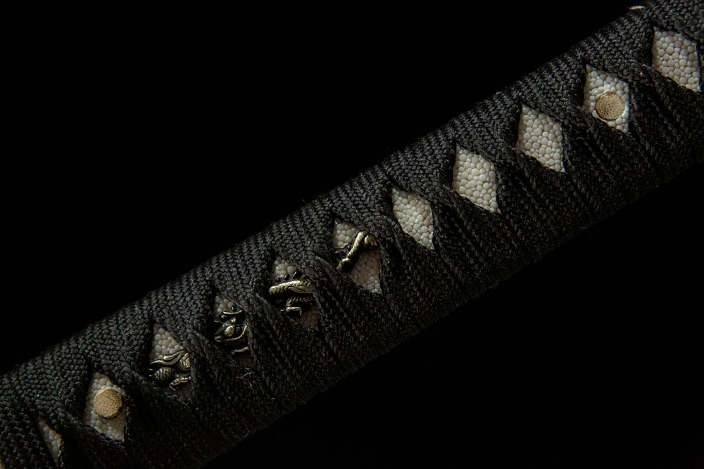 Wind and Cloud Katana handle front view, real ray skin under cotton wrap