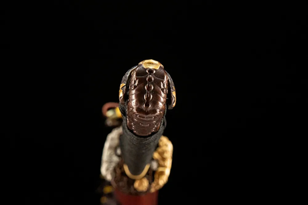 Lion King Tachi kashira, copper gilded silver pommel cap detail