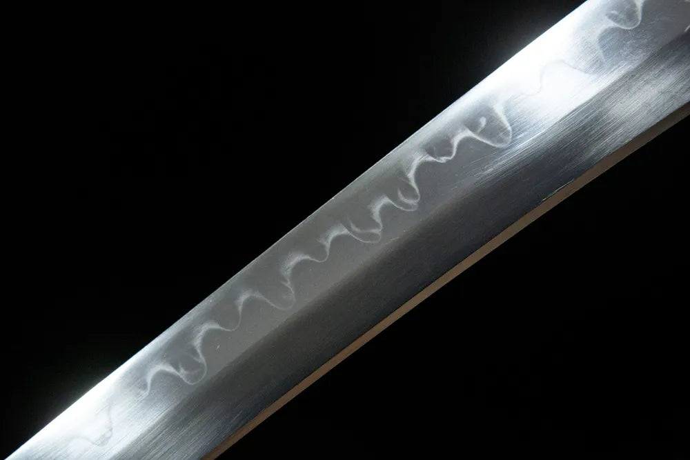 Plum Blossom Dragon Tanto middle blade, classic sanbonsugi three cedar hamon pattern