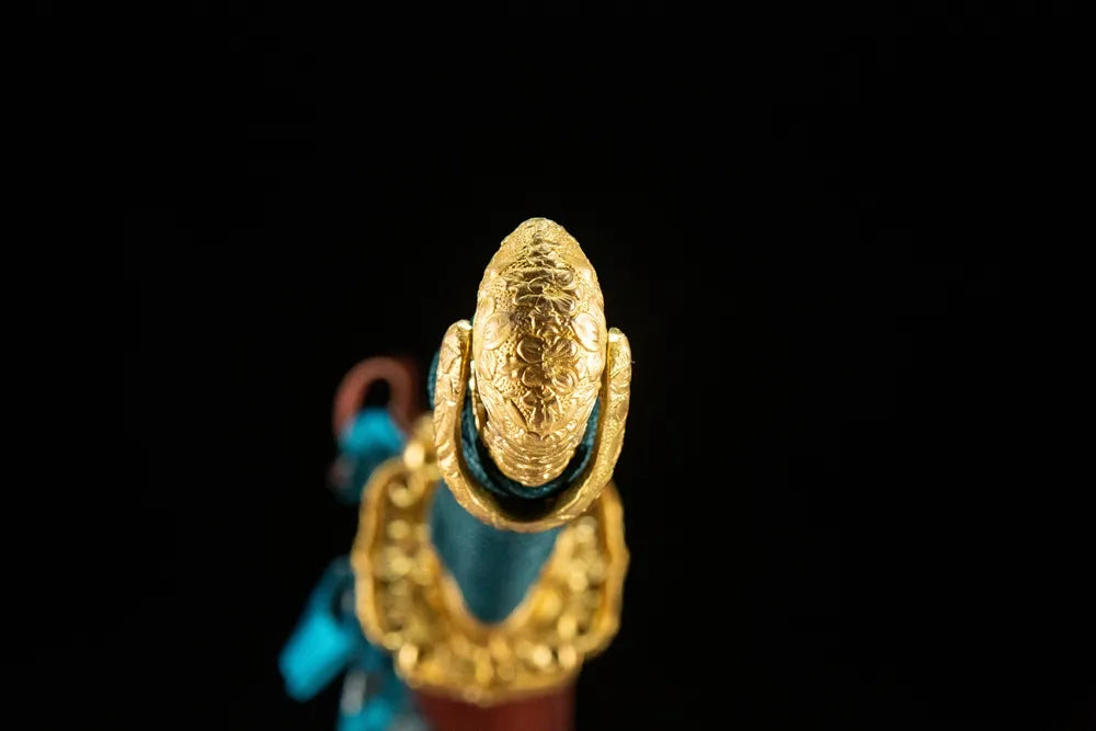 Chrysanthemum Pattern Tachi kashira, solid copper pommel cap detail