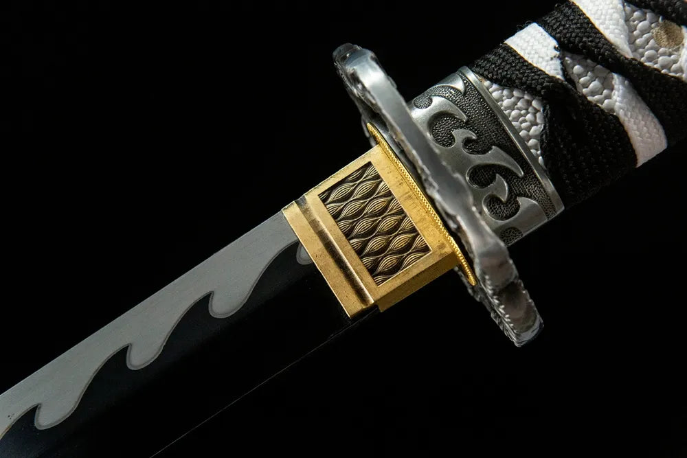 Demon Girl Katana upper blade detail near tsuba, roasted black steel finish