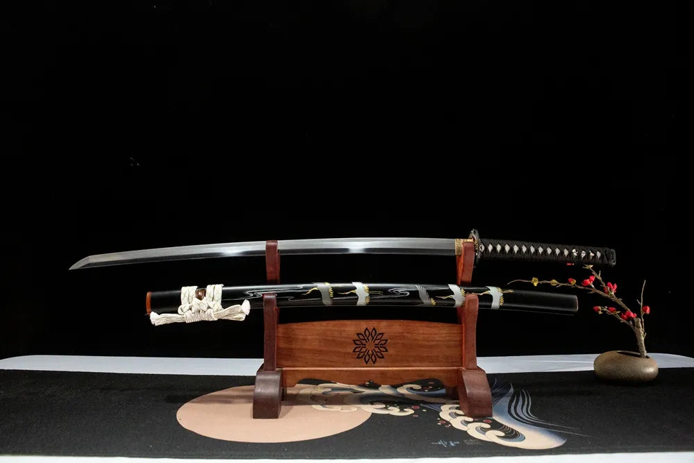 Unsheathed Dancing Crane horizontal shot Honsanmai steel suguha straight hamon tricolor polished blade