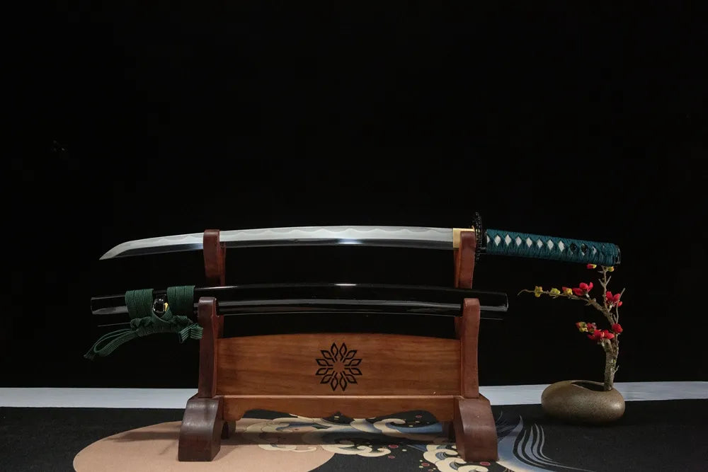 Unsheathed Sankoken Wakizashi horizontal shot sanbonsugi hamon shitaji-togi polished blade