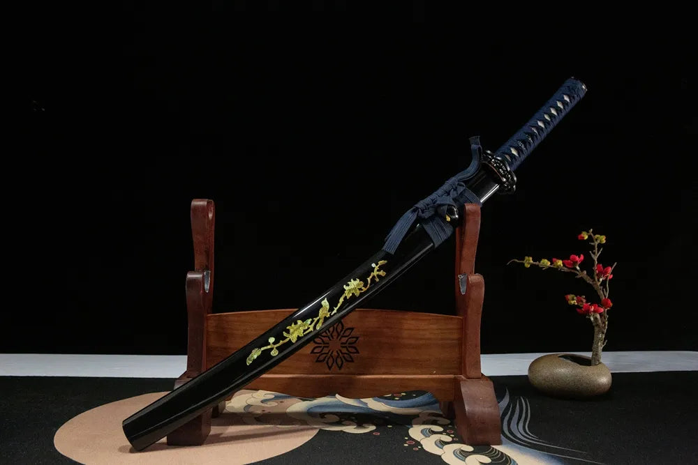 45-degree front view Hummingbird Wakizashi sheathed, dark blue moro-hineri tsuka iron flower tsuba painted scabbard