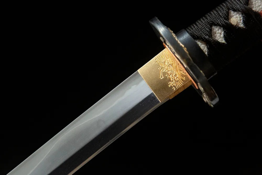 Upper blade closeup neat soft notare hamon near solid copper habaki real yokote