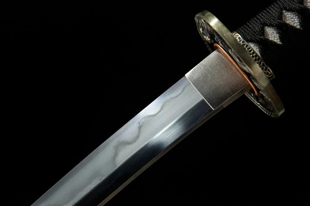 Red Tiger Wakizashi upper blade detail, Gunome hamon near copper habaki T10 steel
