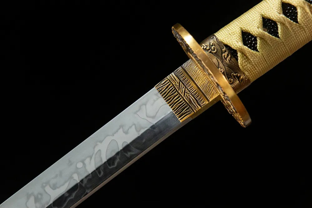 Upper blade closeup T10 hitatsura cloud hamon near solid brass habaki real yokote