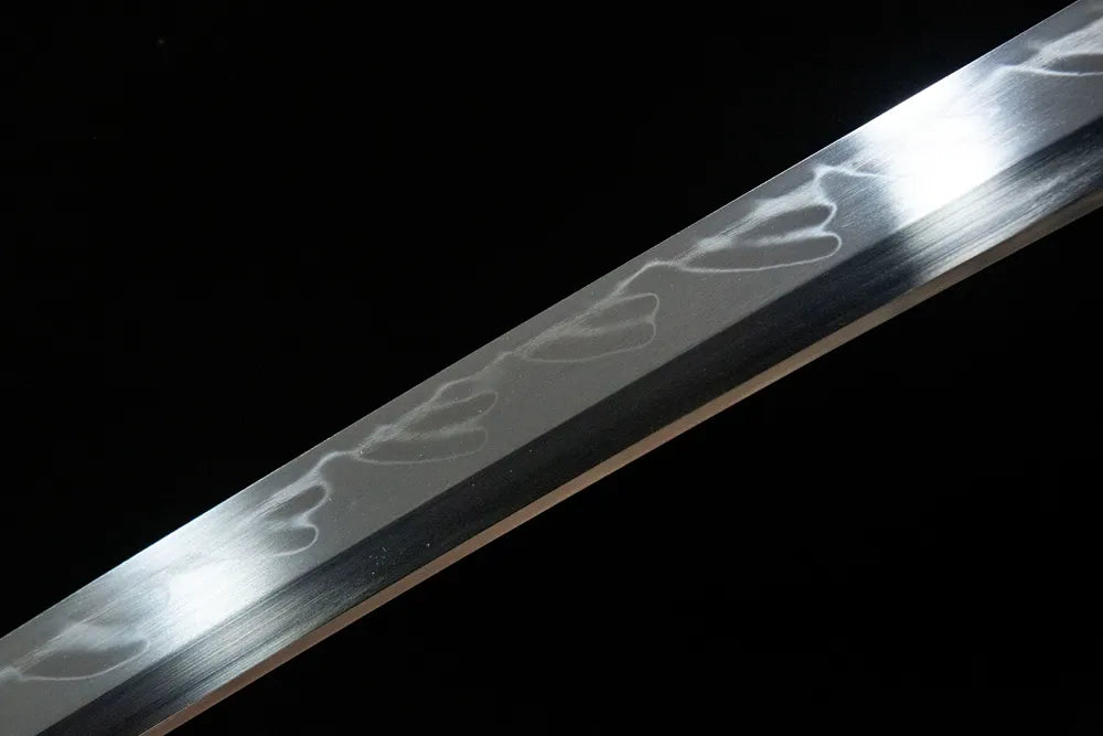 Middle blade detail The Firmament Tachi, continuous wave gunome temper line on solid maru T10 steel