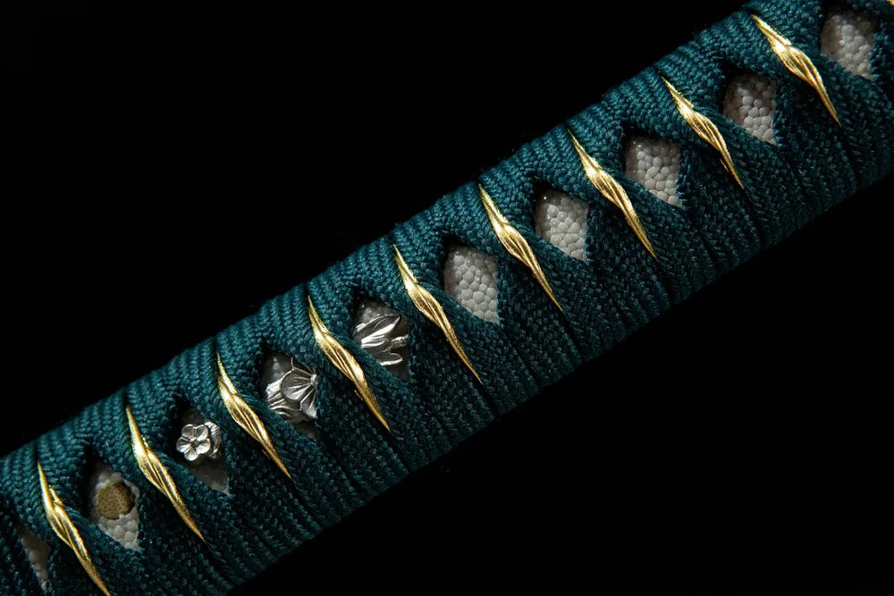 Lotus Heart Katana handle closeup, traditional wrap texture
