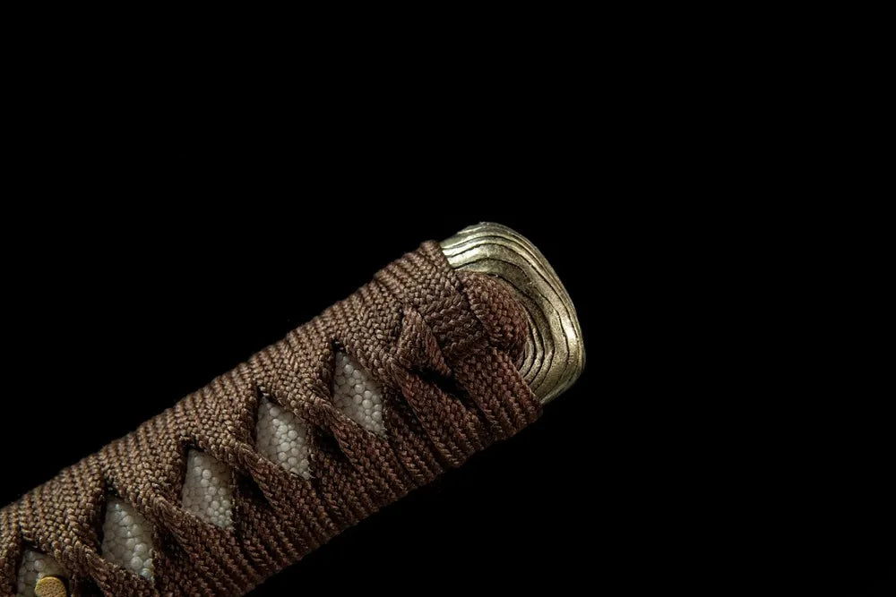 Peach Mountain Katana handle end detail, solid white copper kashira