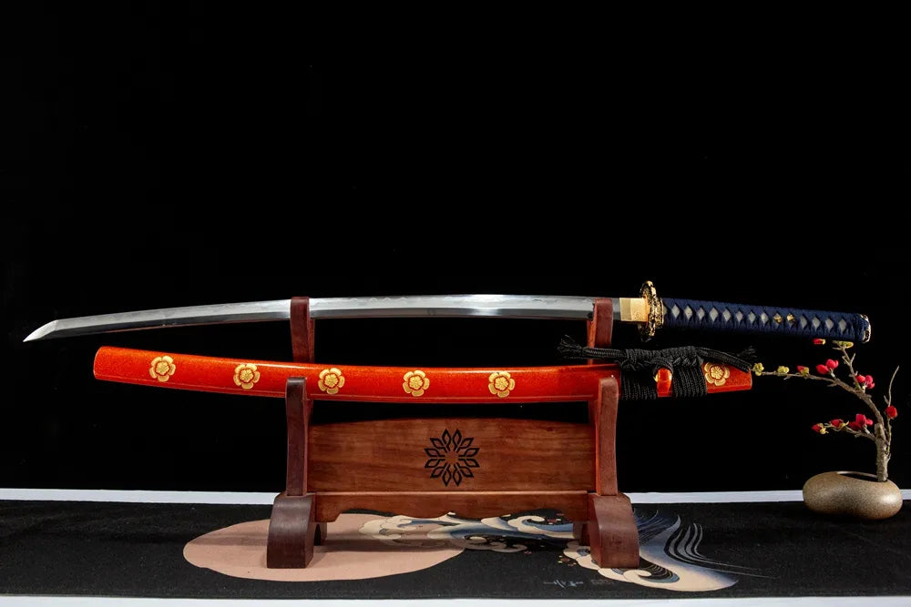 Unsheathed Orange Full horizontal shot sanmai folded T10 gunome wave hamon fine polished blade