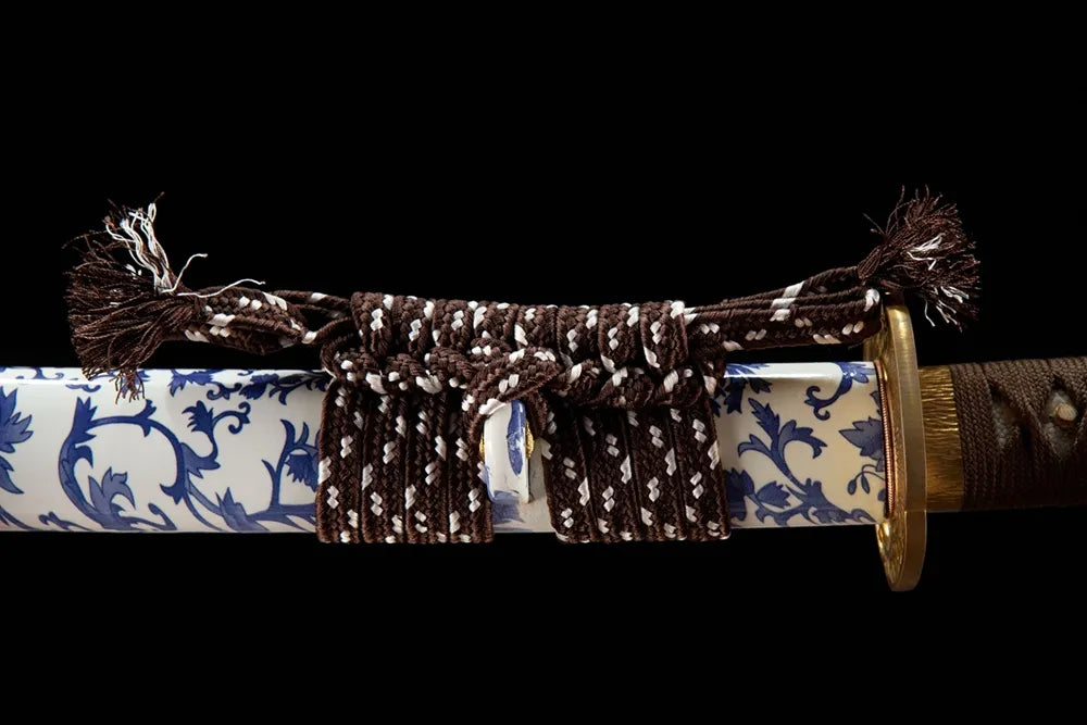 Brown white mixed coarse cotton sageo cord tied on porcelain saya ring