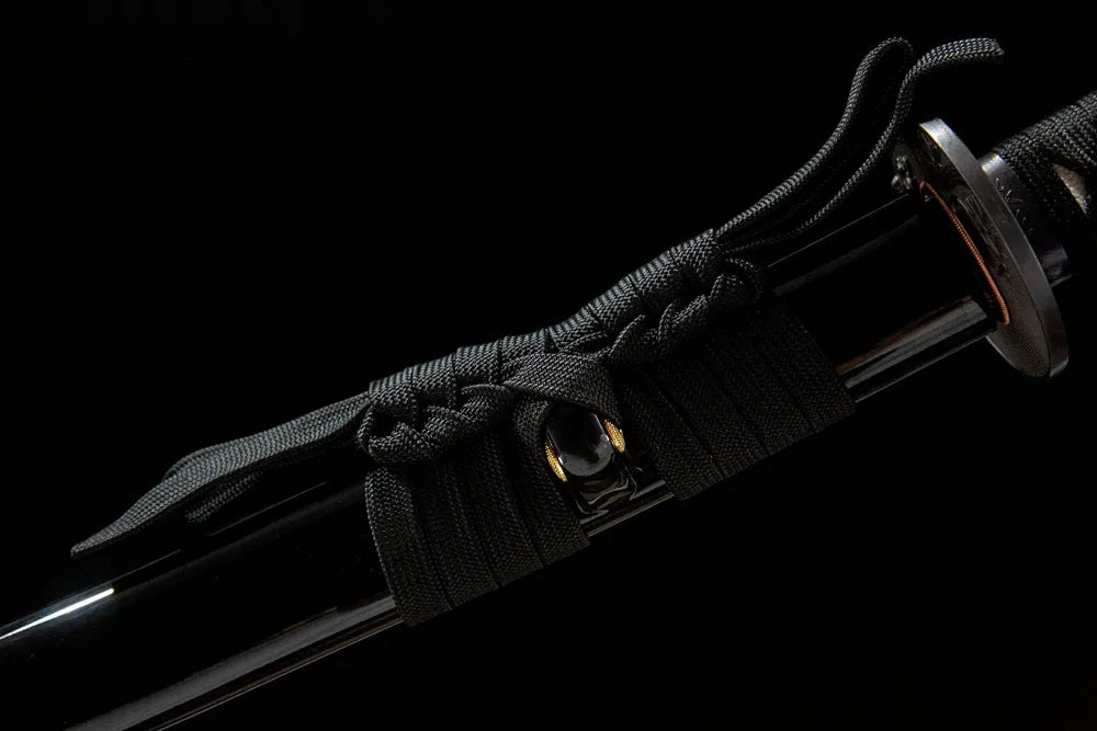 Thick woven cotton sageo cord tied on Fierce Tiger saya ring