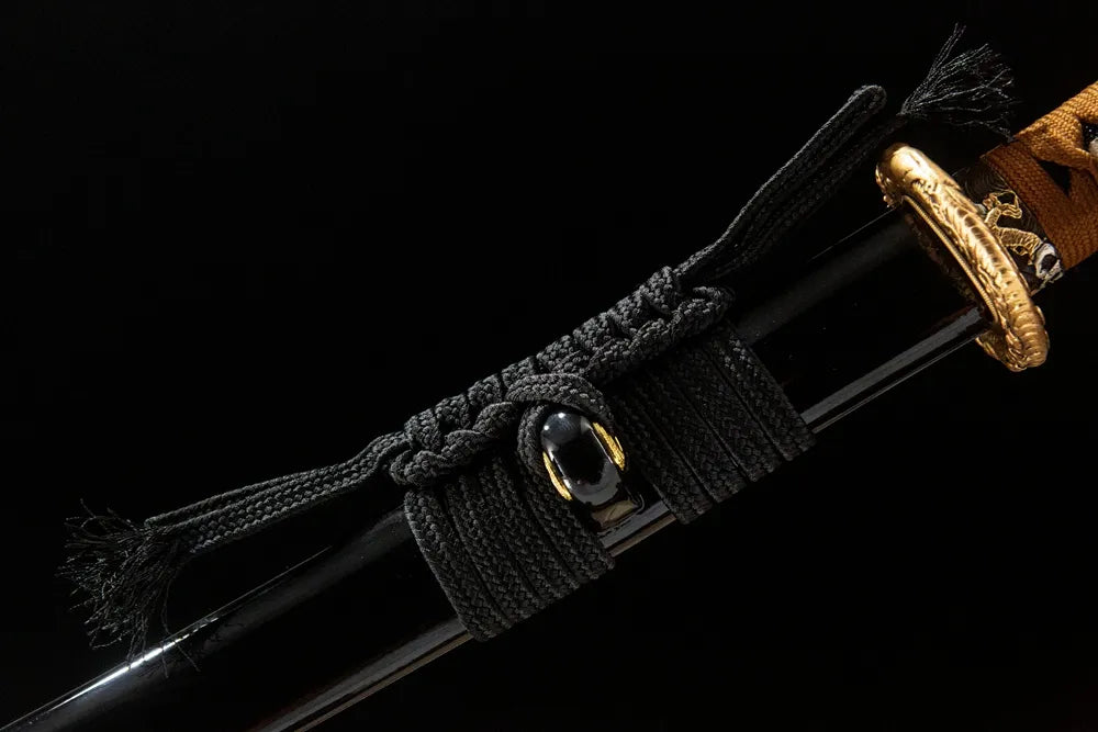 Coarse cotton sageo cord tied on Dragon Soul saya ring