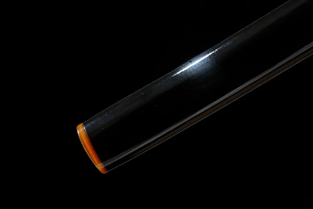 Bottom saya closeup Red-Crowned Crane Katana, solid ox horn kojiri end cap lacquer scabbard