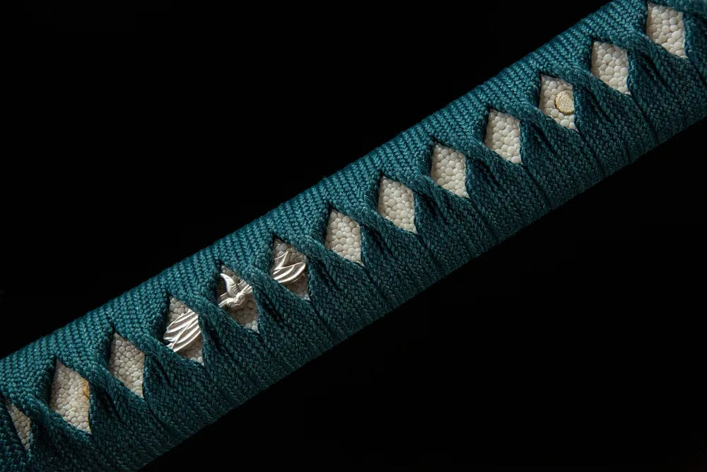 Middle handle front shot natural white ray skin under teal woven cotton ito