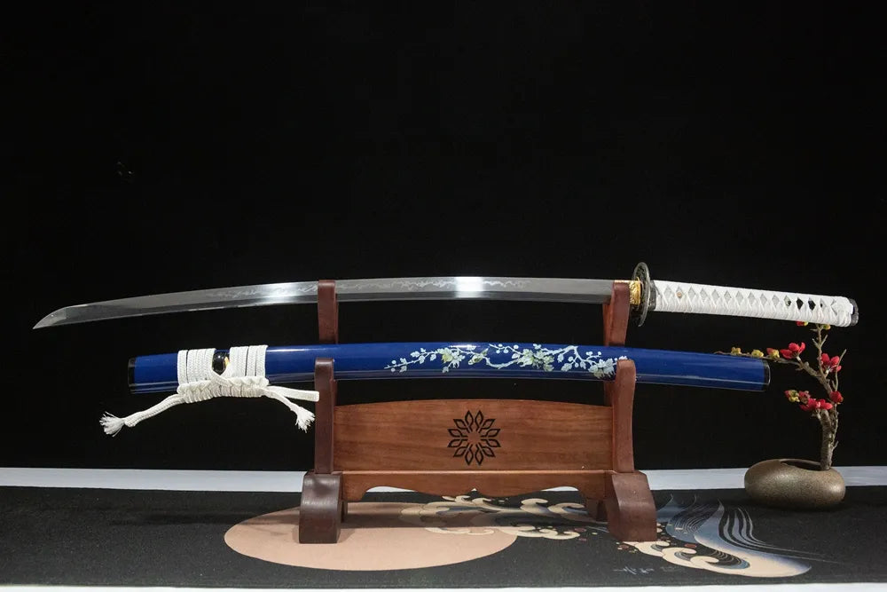 Unsheathed Snow Prunus Mume Katana horizontal shot, clear sanbonsugi three cedar hamon single full blood groove blade