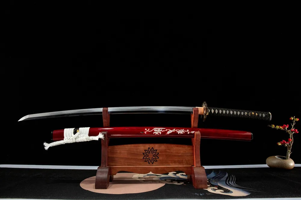 Unsheathed Imu Maru horizontal shot T10 clay tempered smooth notare wave hamon blade