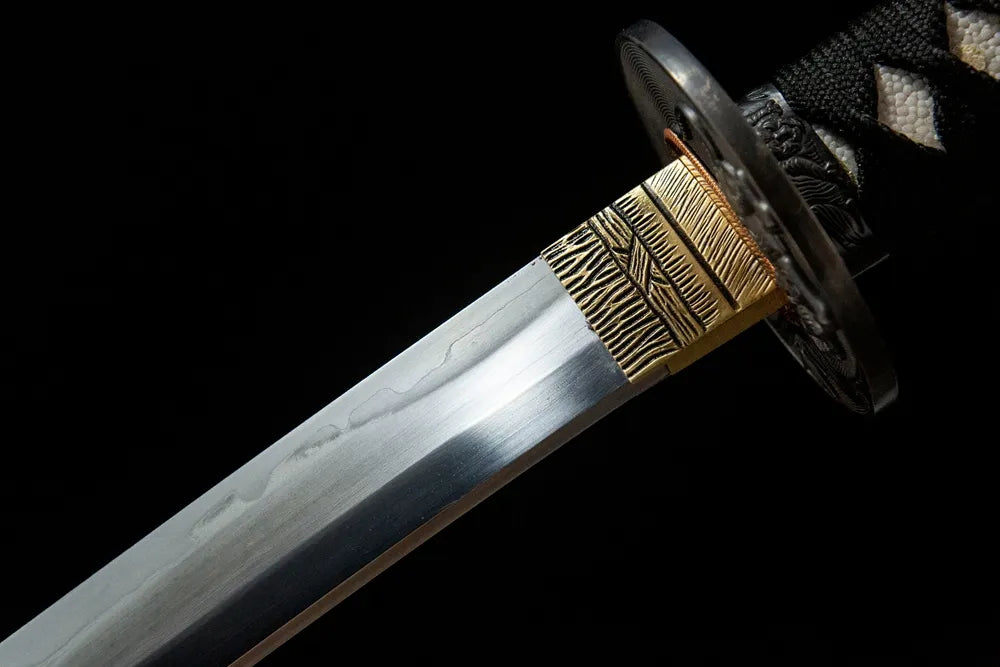 Upper blade closeup Fierce Tiger Katana natural notare hamon near solid copper habaki real yokote