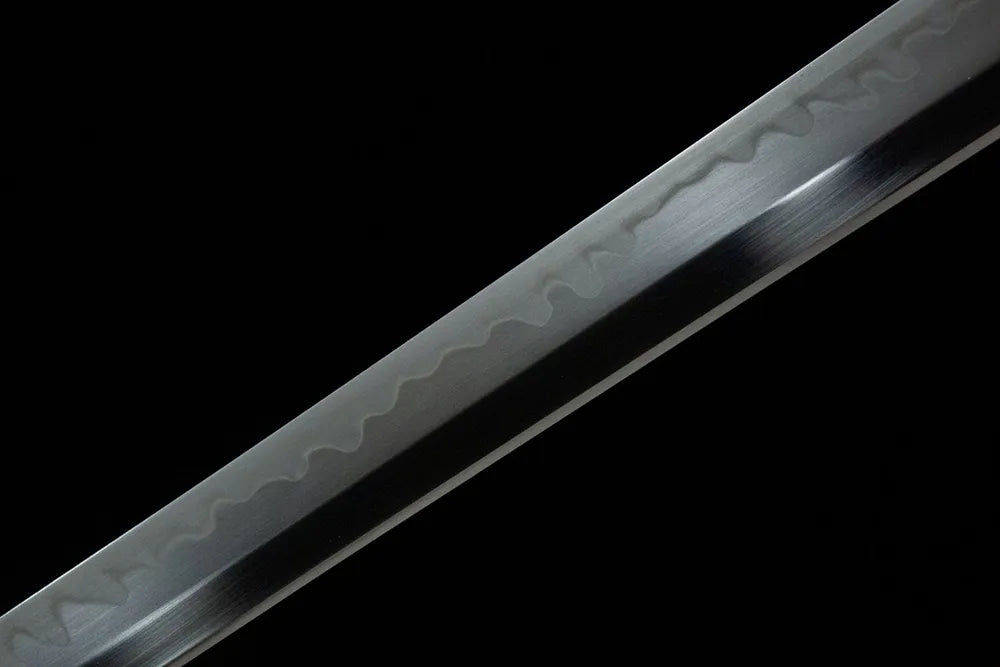 Middle blade detail continuous rounded gunome temper grain smooth steel surface