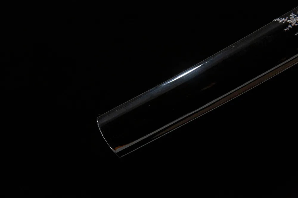 Bottom saya closeup smooth black wood sheath plain end cap