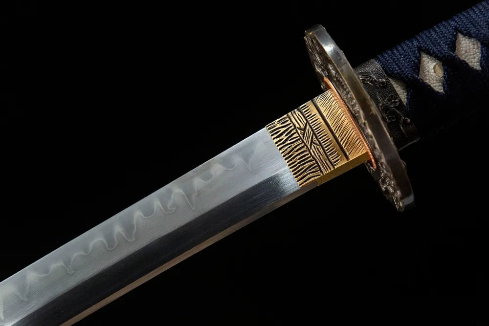 Upper blade closeup Plover neat gunome hamon near solid copper habaki