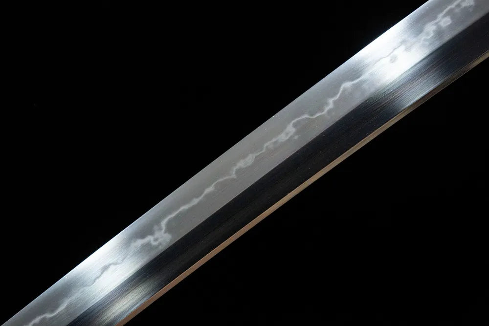 Middle blade detail Red-Crowned Crane Katana, natural irregular mottled temper line texture on maru steel