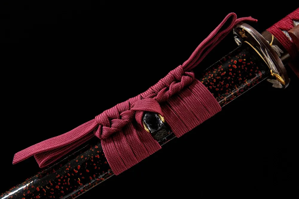 Red Dragonfly Katana cotton sageo cord closeup, traditional sheath tie