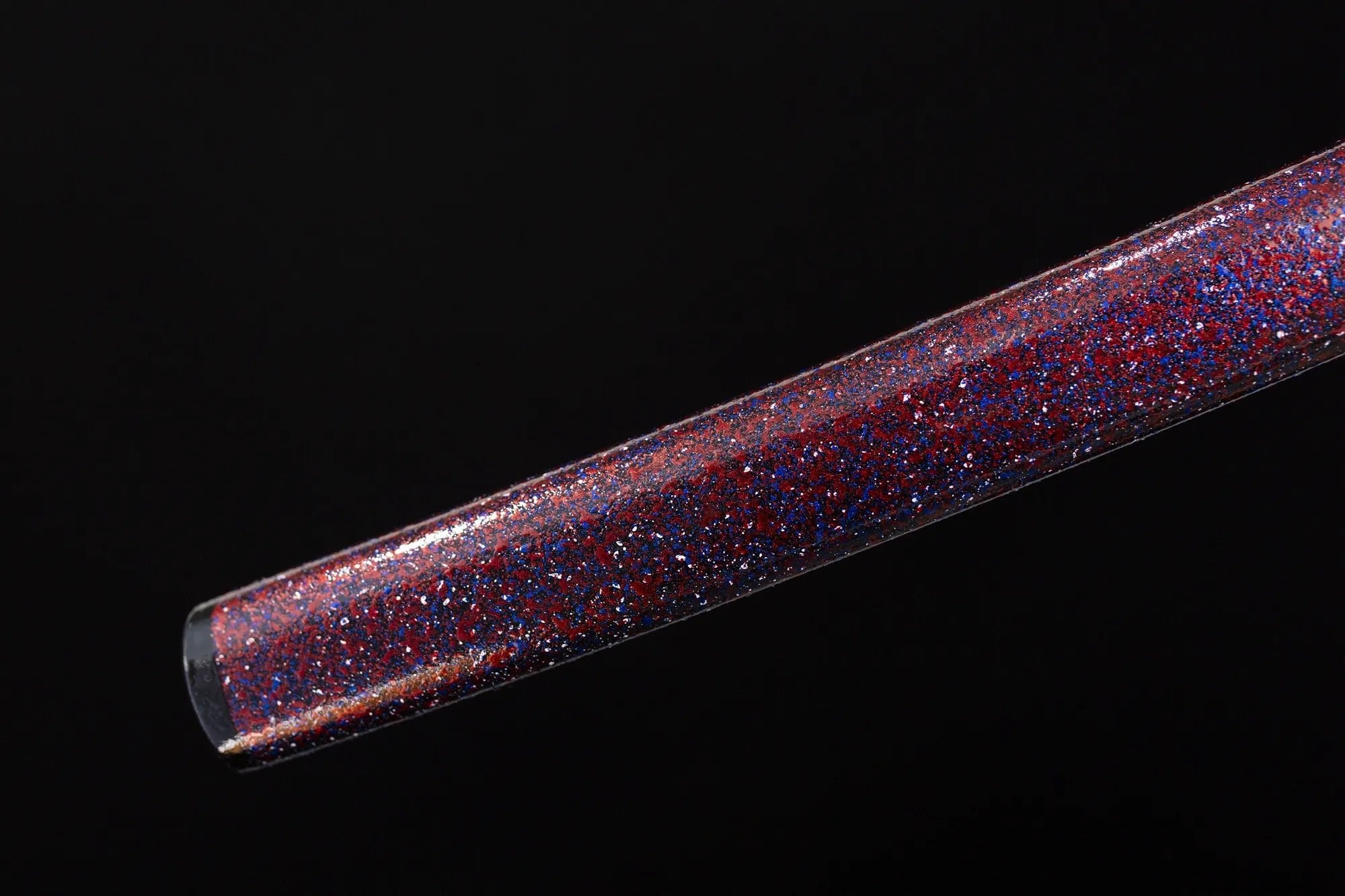 The purple katana is forged from T10 steel