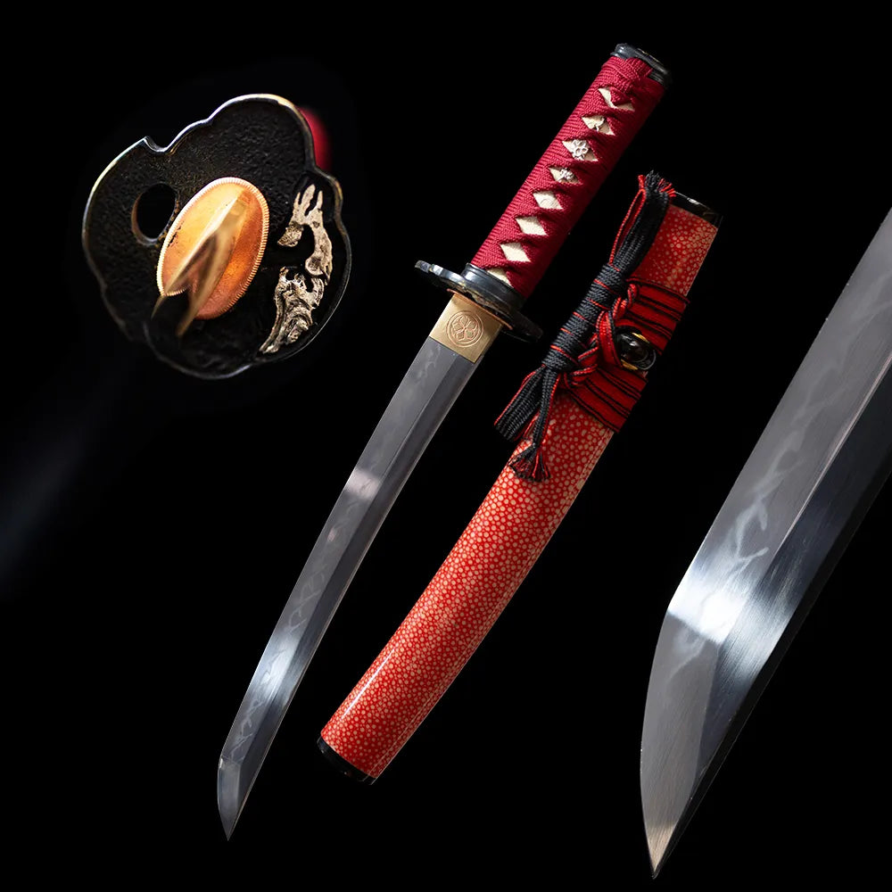 Red‑Plum‑Wakizashi classical red‑plum floral‑art wakizashi short samurai sword drawn T10 suguha clean straight hamon blade red faux‑ray‑skin maki‑e saya full black‑background studio shot