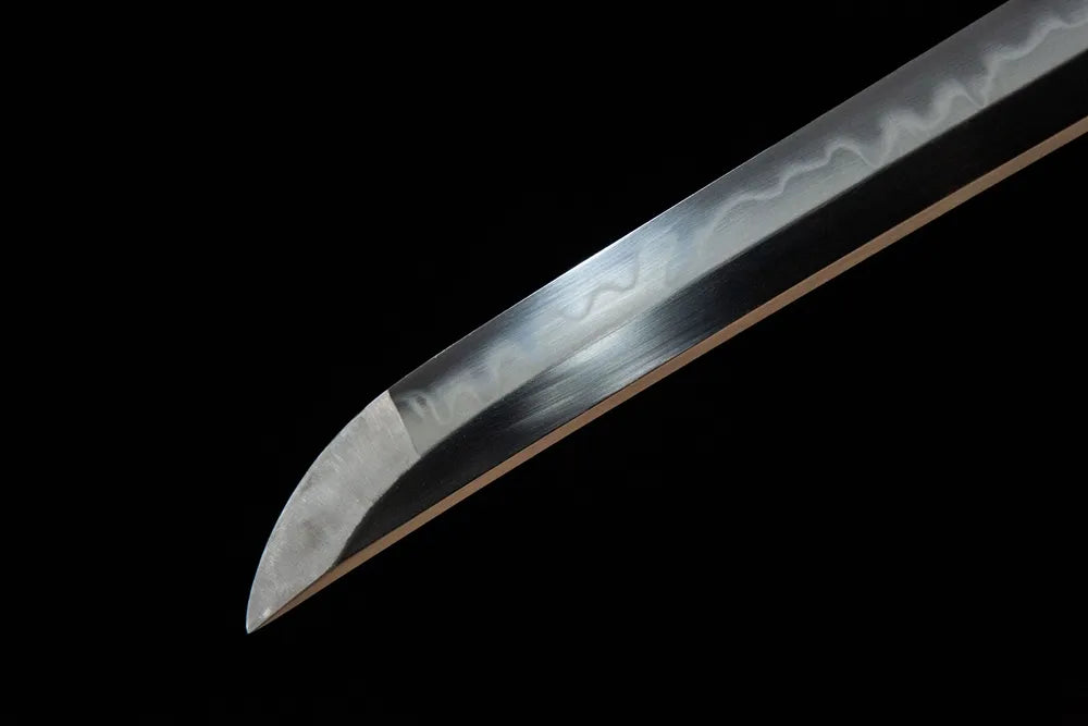 Chrysanthemum Pattern Tachi blade tip detail, finely polished cutting edge