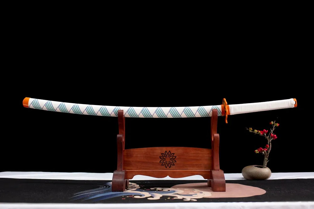 Horizontal laid closed white wave‑pattern printed Rengoku scabbard flat table display