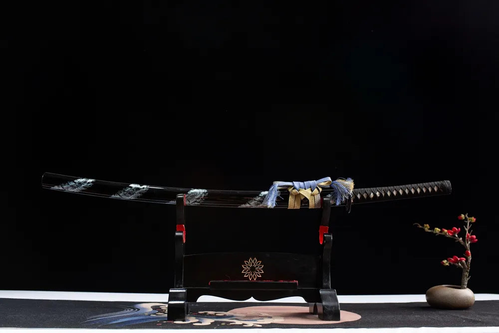 Horizontal laid closed full flying crane samurai sword on linen surface