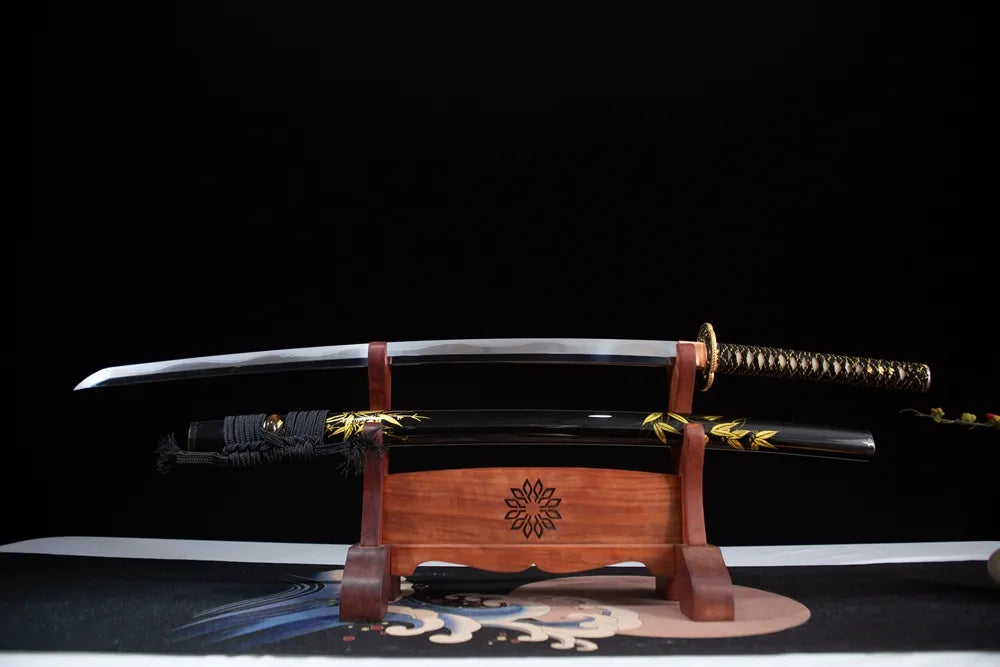 Flat lay fully drawn T10 choji clay tempered blade