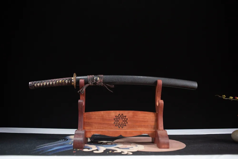 Horizontal laid closed all black compact side sword