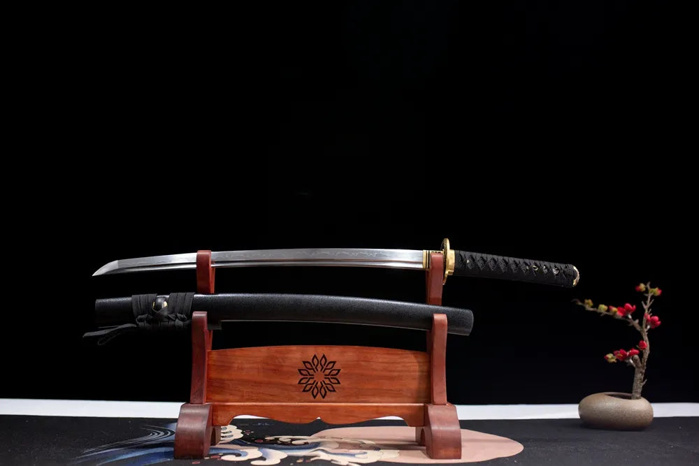 Flat fully‑drawn T10 clay‑tempered Diamond wakizashi hamon blade wooden rack front shot