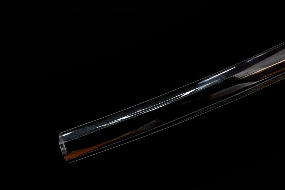 Bottom high‑gloss‑piano‑black saya brass kojiri end‑cap close‑up