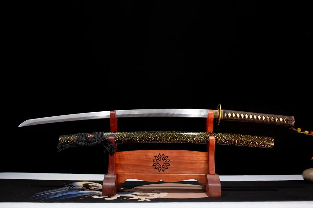 Flat fully‑drawn hand‑forged damascus‑steel wave‑pattern‑hamon Paper‑Cranes‑Katana blade wooden rack front shot