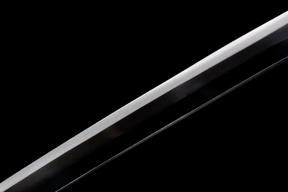 Mid‑section smooth black finished Tanjirou blade surface front close‑up