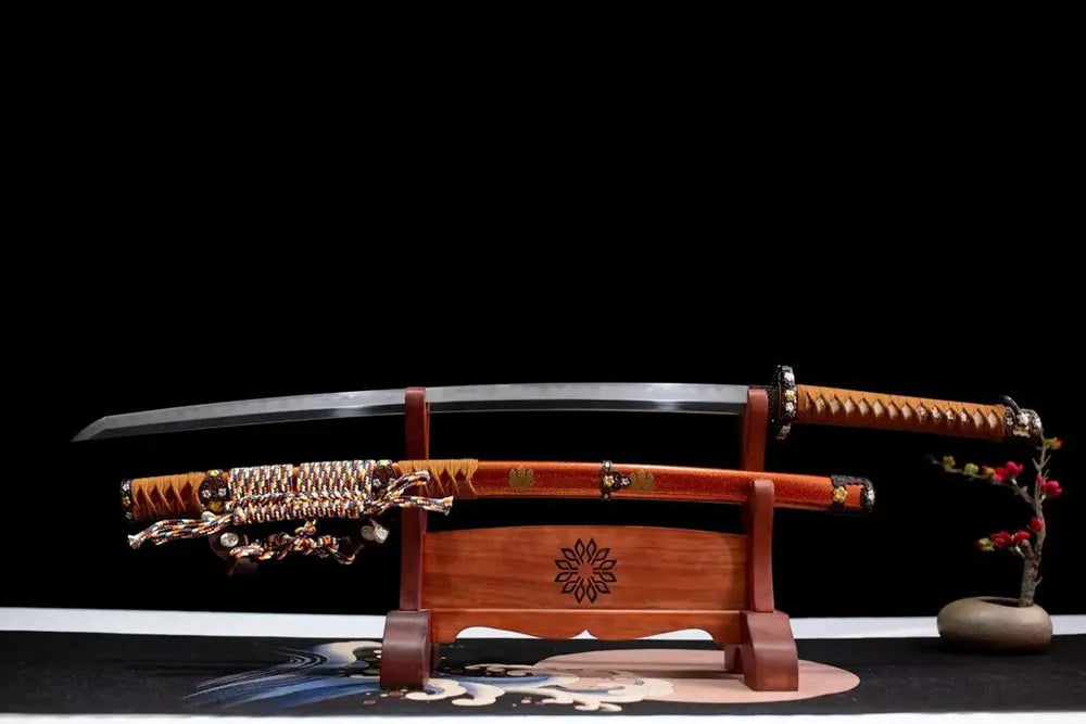 Flat fully‑drawn sanmai‑gitae composite forged Hideyoshi tachi gunome hamon blade wooden rack front shot