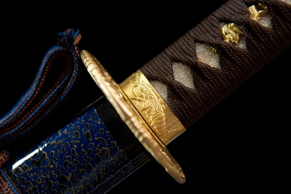 Golden prawn relief grip ring close view