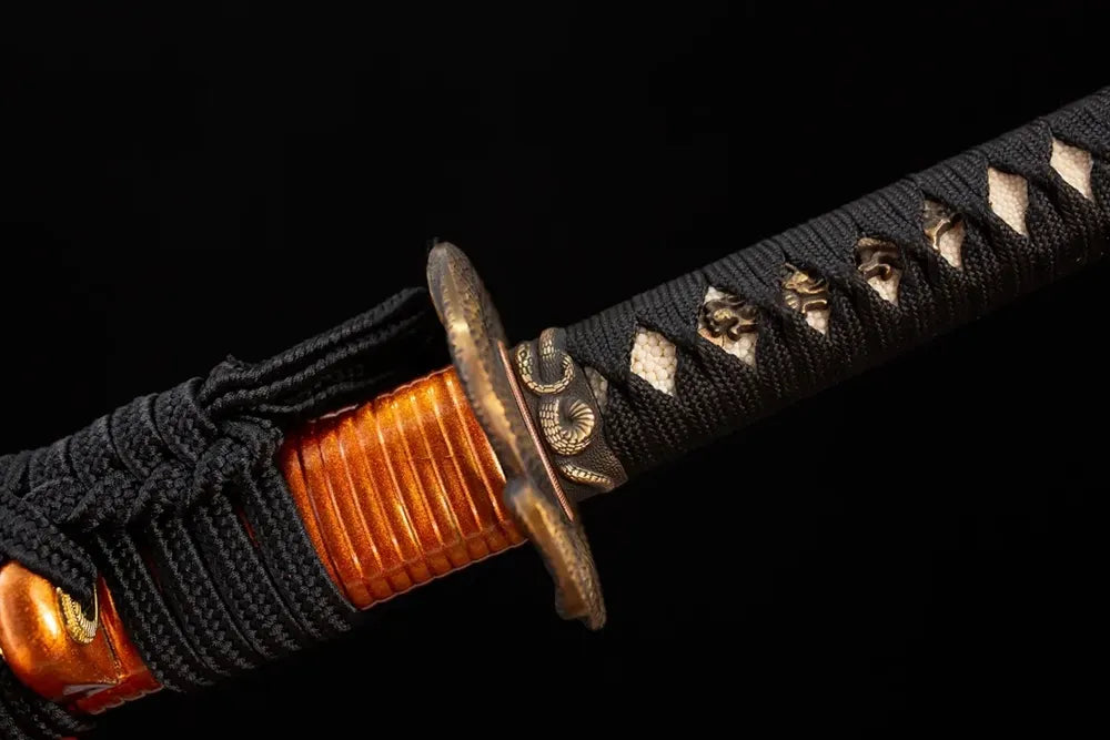 Octagonal‑coiled‑serpent‑relief antique‑copper fuchi grip‑ring macro close‑up