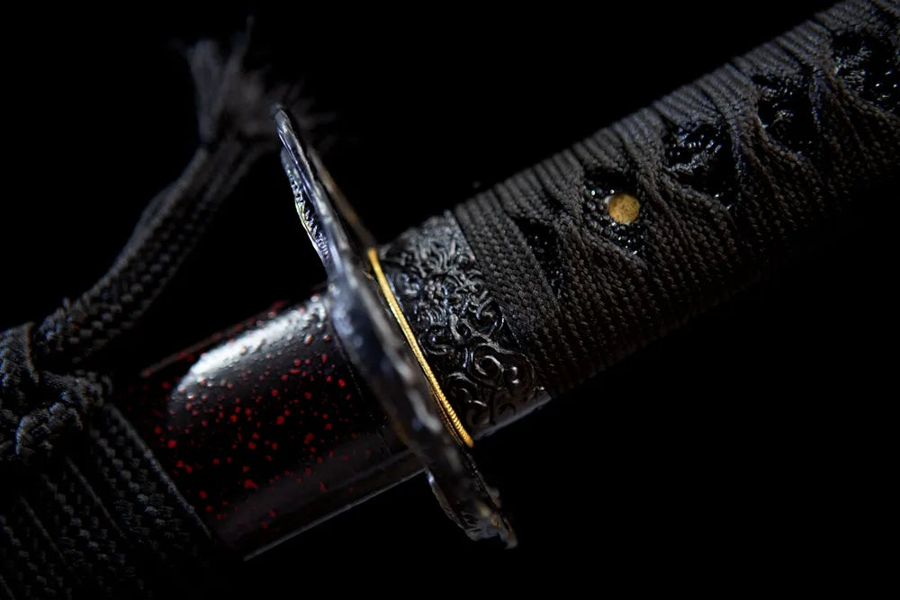 Gold lined dragon fuchi fitting close view