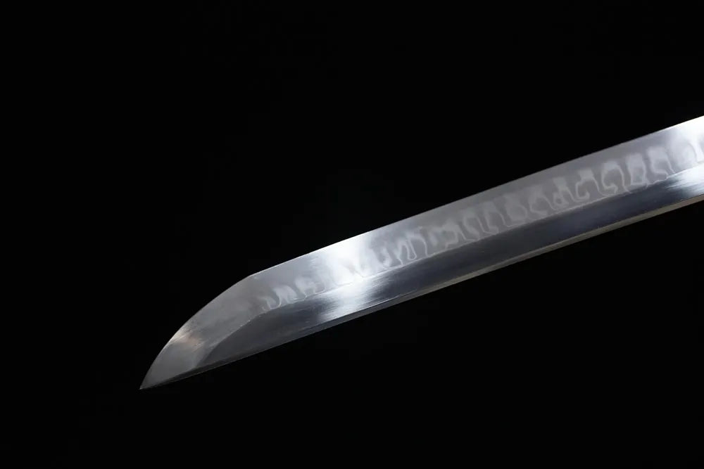 Classic functional katana‑style kissaki tip of Black‑Warrior‑Katana blade close‑up view