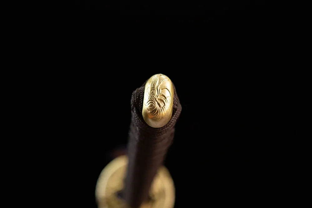 Solid golden prawn embossed pommel cap