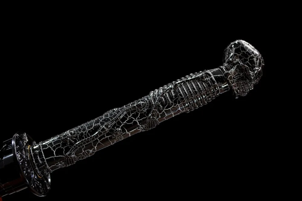 Full cracked‑texture tsuka skull‑relief dark‑alloy fittings complete front shot